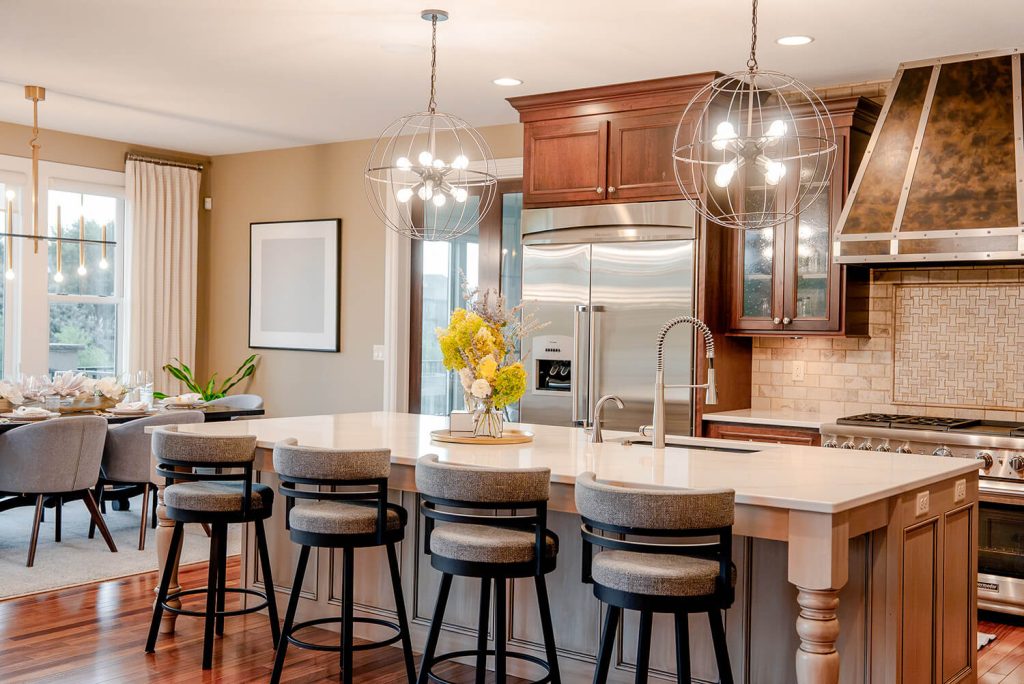 taylor-jane-front-image-dining Bright kitchen and dining space with wood cabinetry.