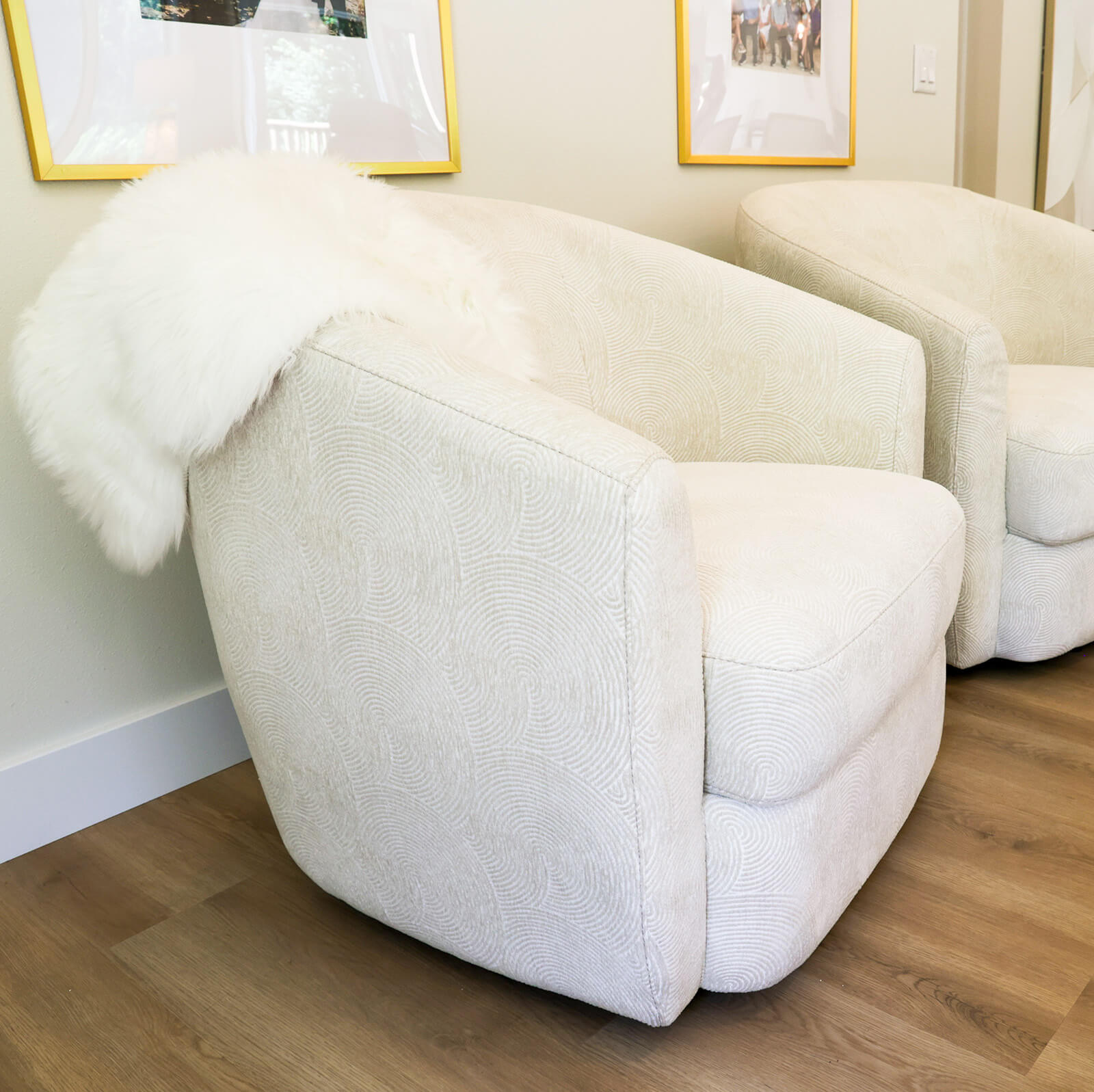 the-fairway-project-16 White textured fabric accent chair with a fur blanket