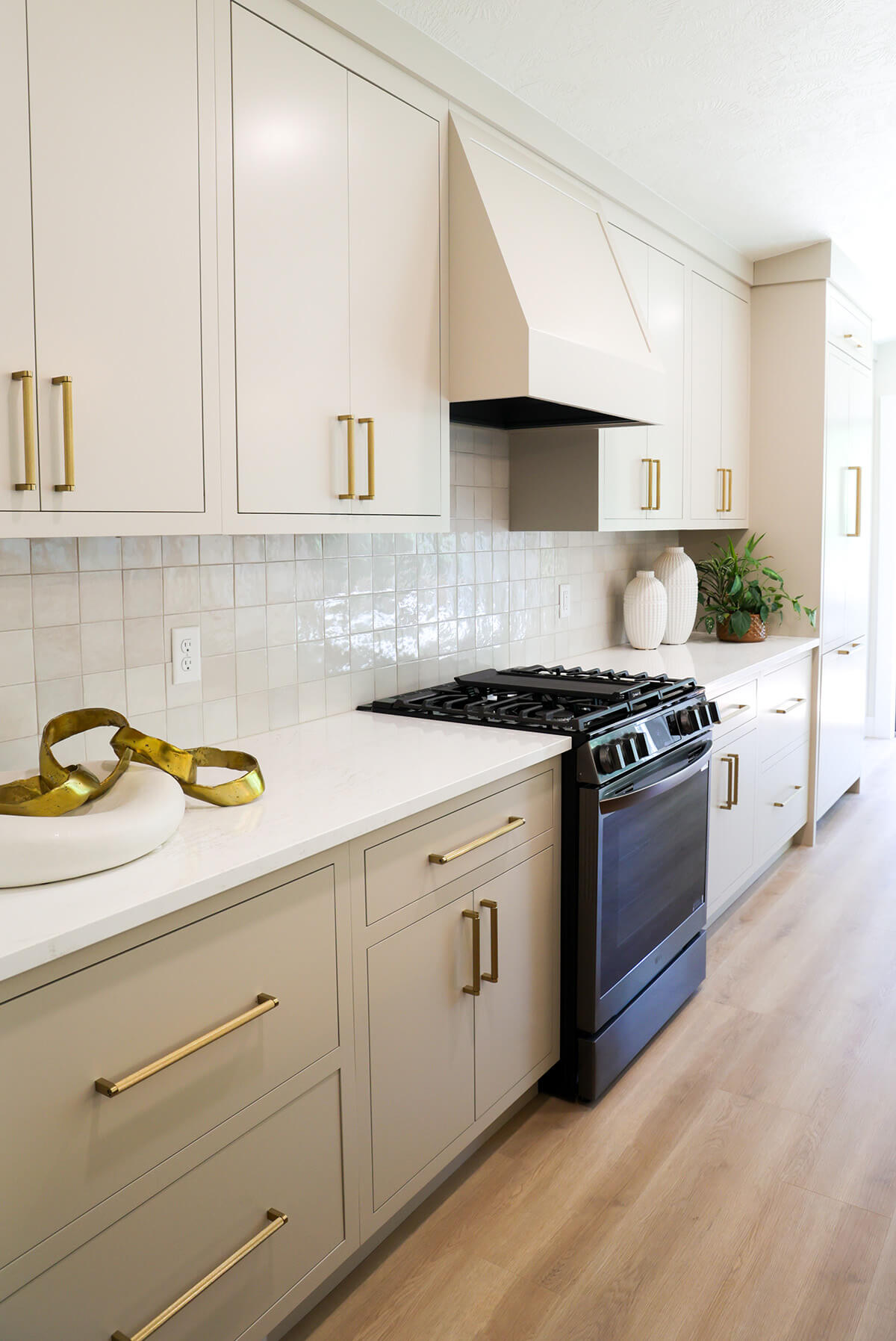 the-fairway-project-17 White custom cabinets with gold hardware and white countertops