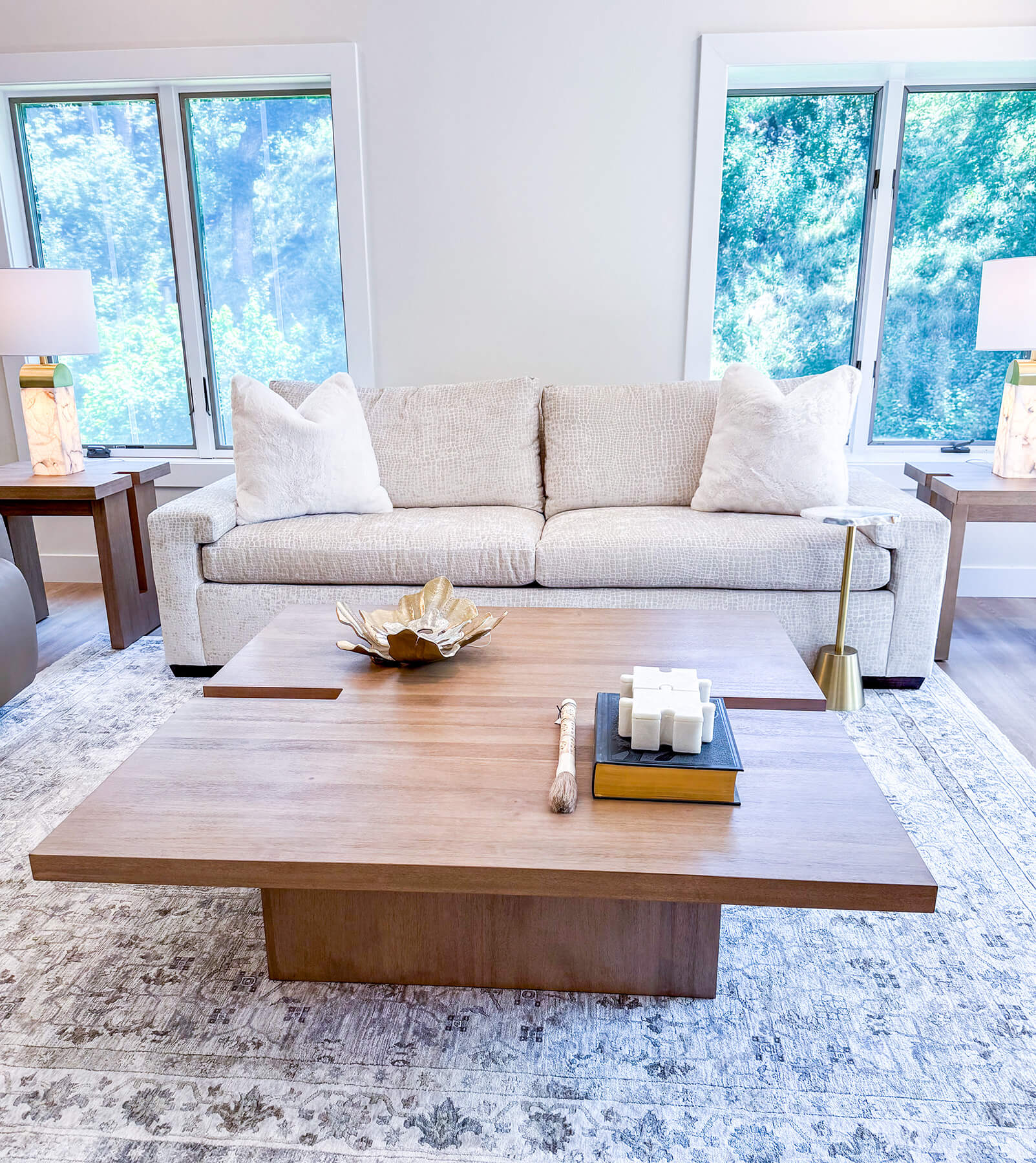 the-fairway-project-23 Timeless white loveseat with coordinating natural wood tables