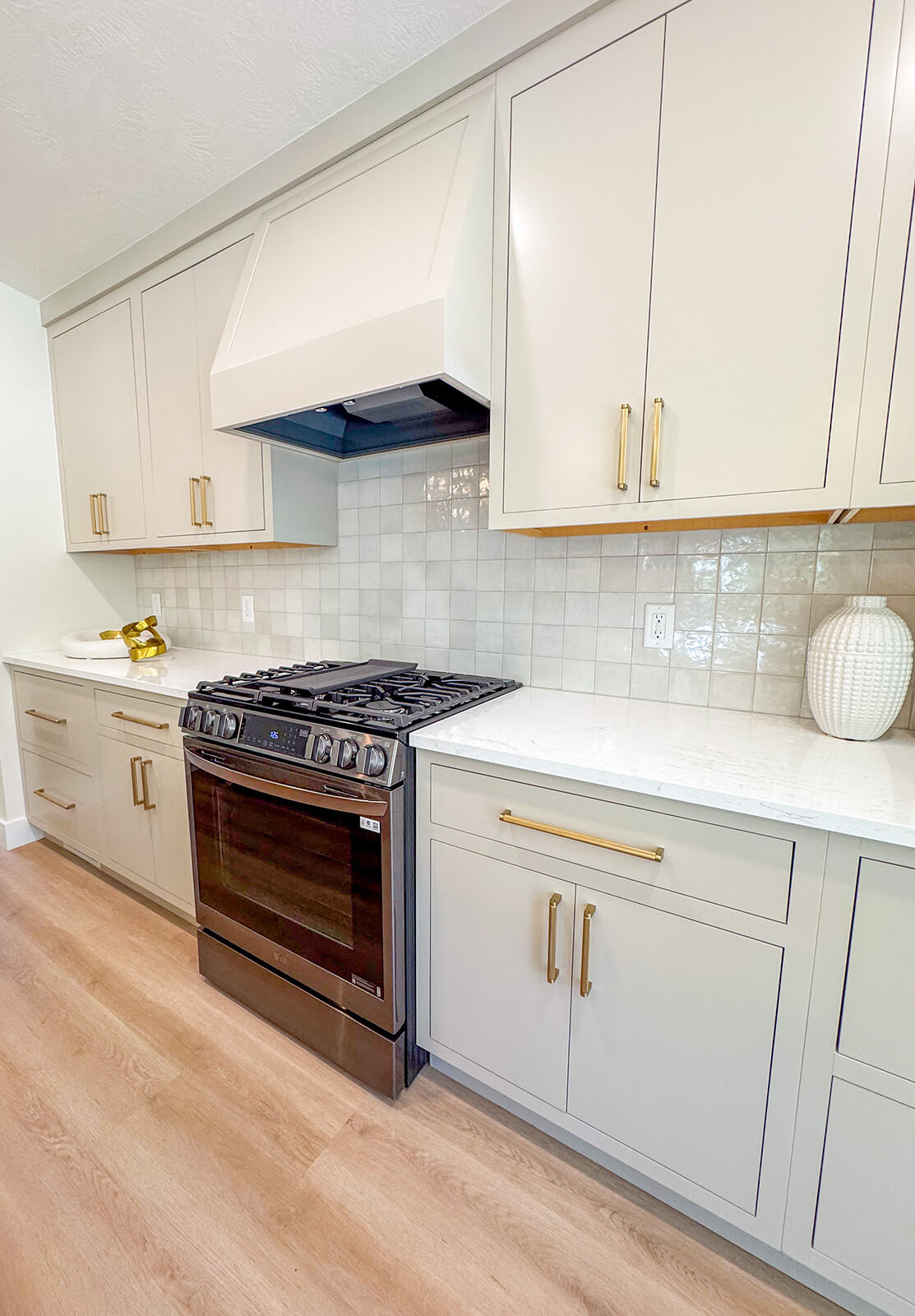 the-fairway-project-5 Bright, modern white kitchen with custom cabinetry design in a Sioux Falls home