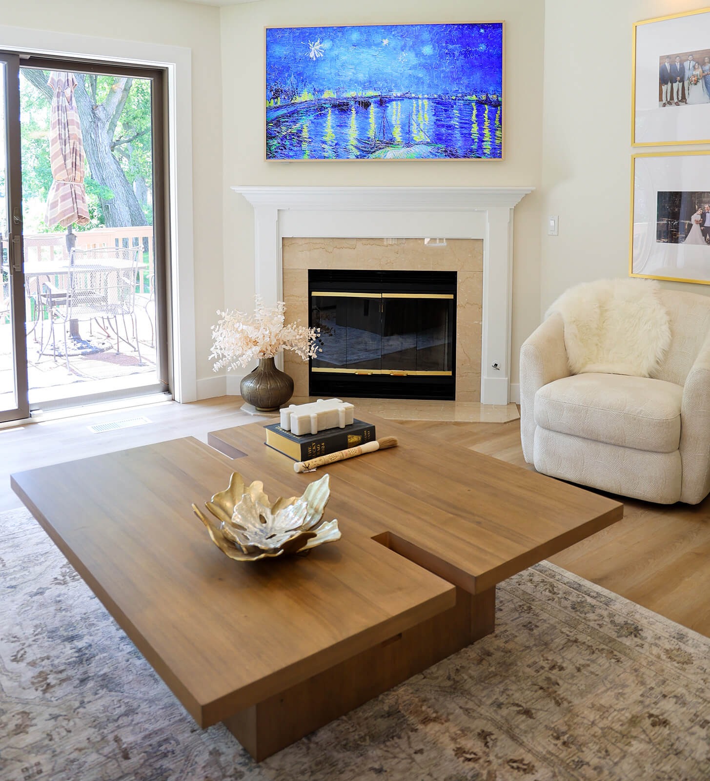 the-fairway-project-8 Inviting living area with fireplace mantel and wood accent table featuring decorative cutouts