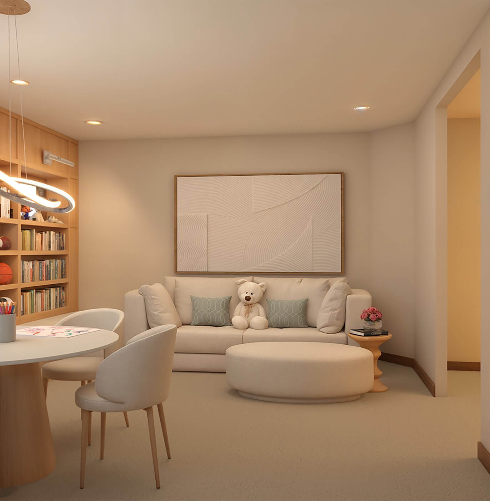 the-little-library-project-9 Neutral-toned family room with cream sectional, sage pillows, teddy bear, and abstract art above the sofa.