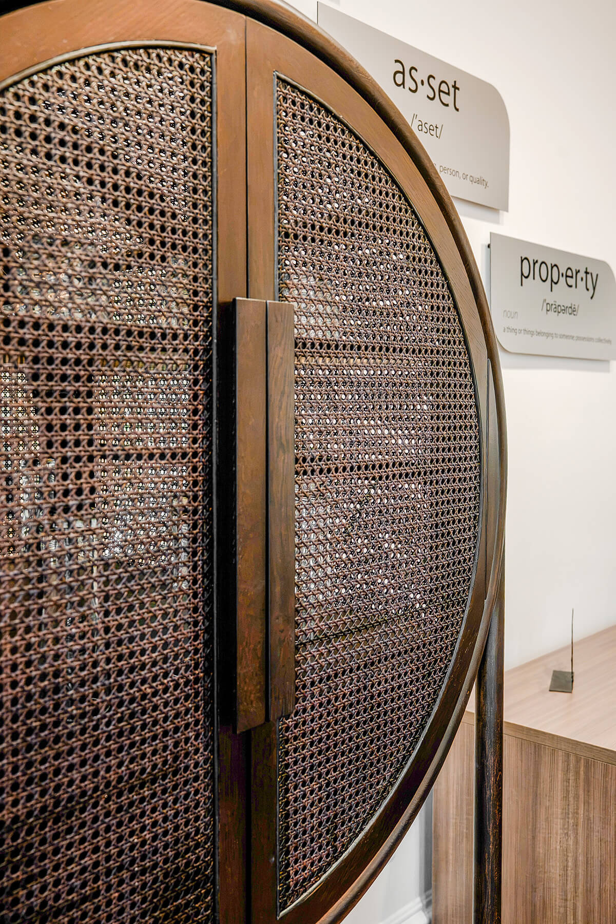 principle-properties-project-4 Curved woven room divider separating spaces in a modern office interior